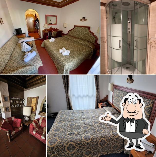 Siediti a un tavolo di Hotel Sporting