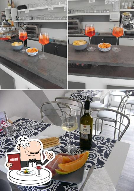 La immagine della cibo e tavolo da pranzo di Bar al Diciassette