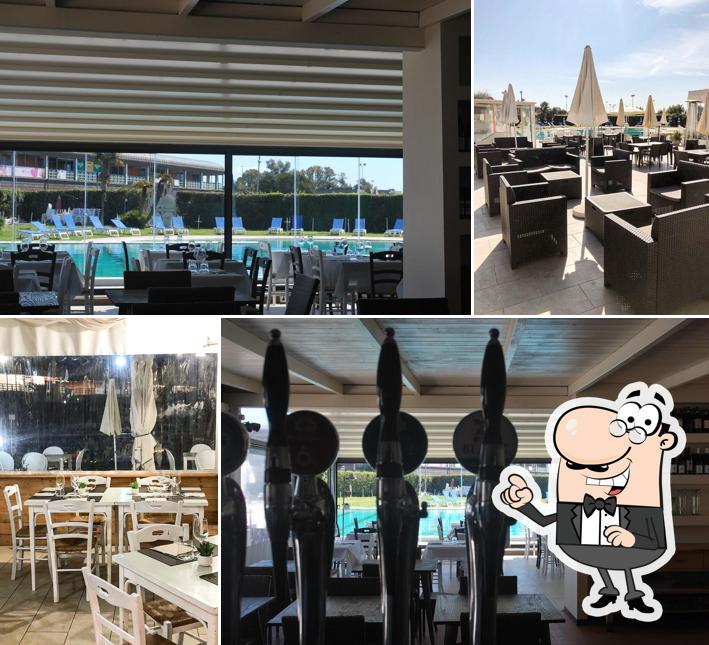 Dai un'occhiata agli interni di Aris Ristorante & pizzeria & Wine Pub