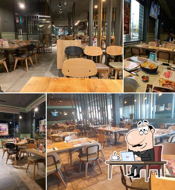 Dai un'occhiata agli interni di Roadhouse Restaurant Noventa di Piave