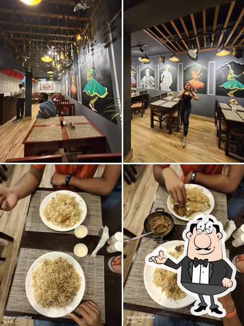 Take a seat at one of the tables at The New Biryanchi's