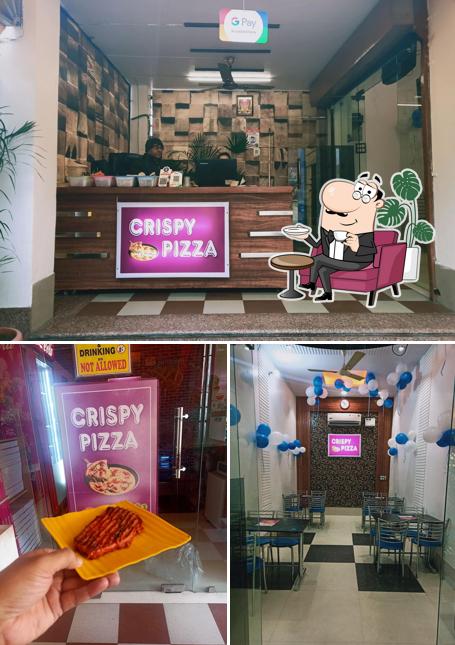 Among different things one can find interior and food at Crispy Pizza