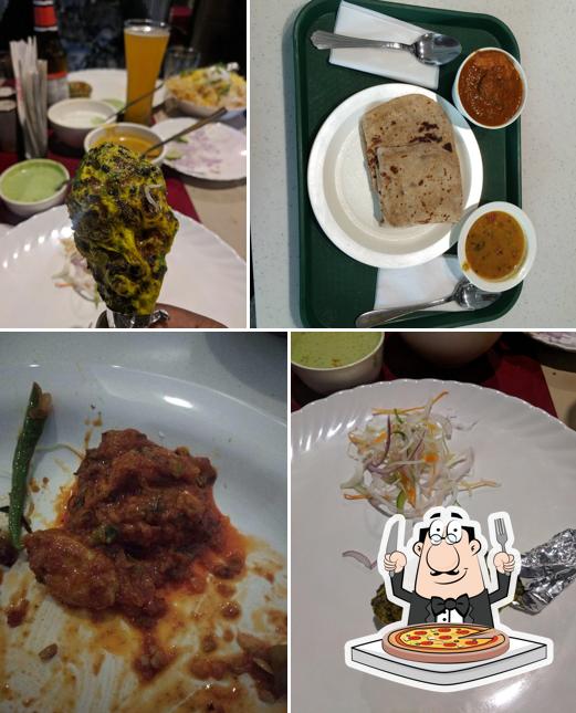 Get pizza at Big Spice Bar And Restaurant