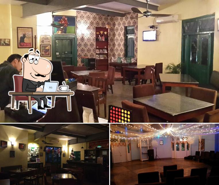 Take a seat at one of the tables at Cafe Regal