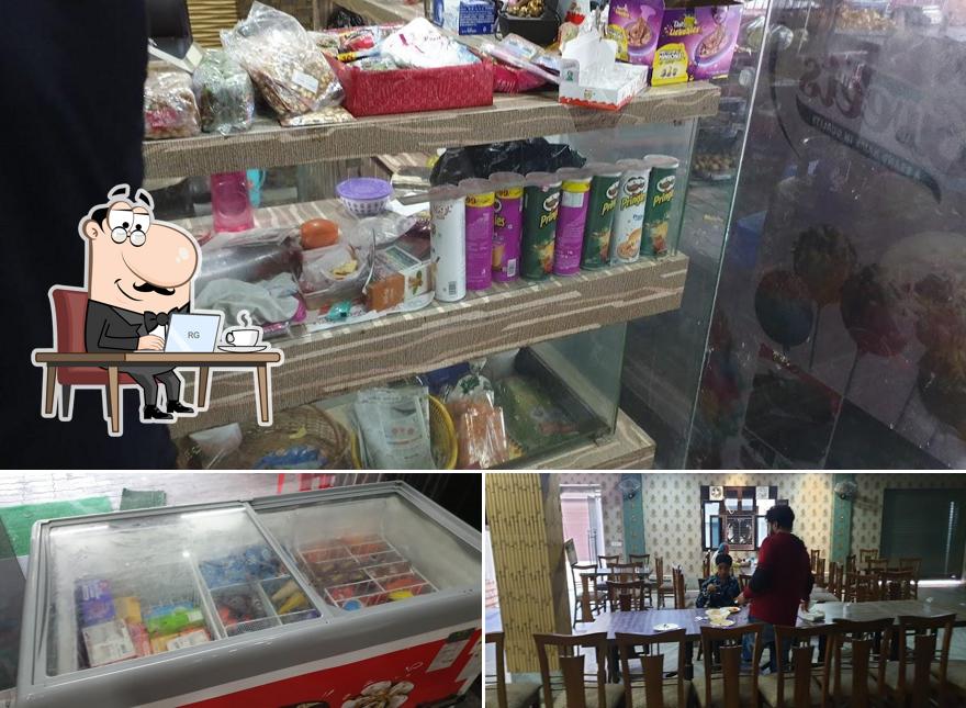 Take a seat at one of the tables at Chinar Sweets and Bakery