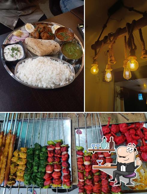 The picture of interior and food at BIRYANI AND BBQ