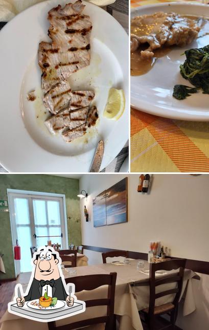 Trattoria C'era Una Volta si caratterizza per la cibo e interni