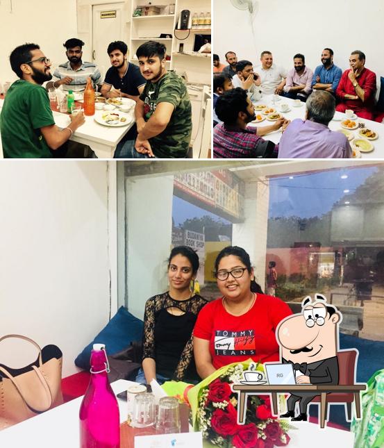 Take a seat at one of the tables at Pardhan Dhaba