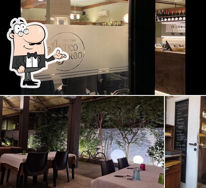 Dai un'occhiata agli interni di Trattoria Antico Borgo