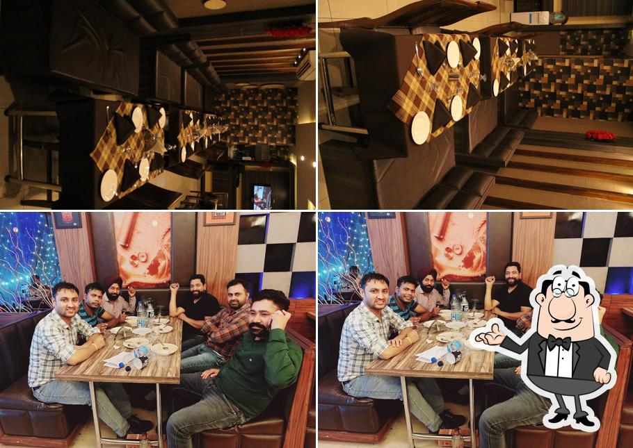 Take a seat at one of the tables at J7 Bar & Restaurant