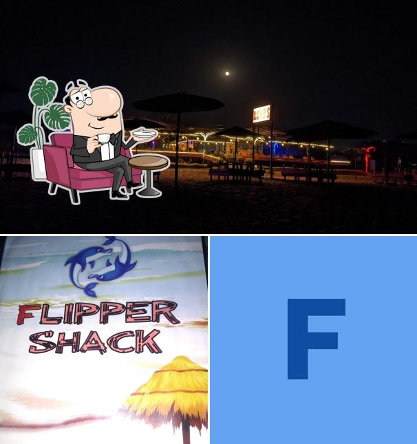 Take a seat at one of the tables at Flipper Shack