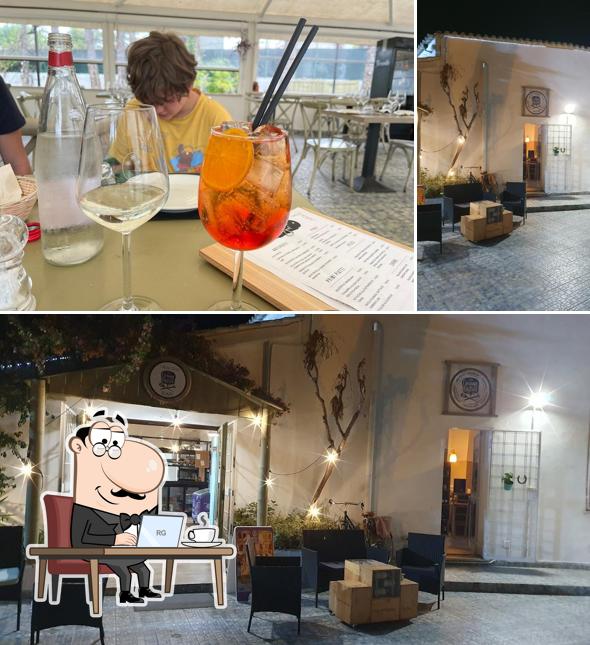 Siediti a un tavolo di The garage bistrot