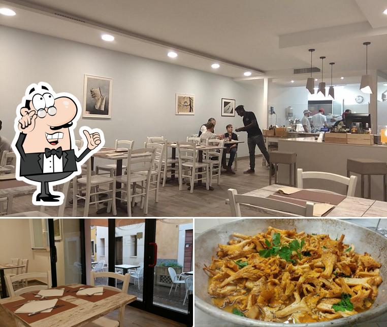 La immagine di interni e cibo da Pizza Punto E A Capo
