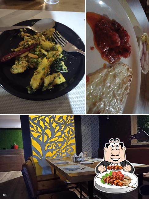 The photo of Grand Vistara Restaurant’s food and interior