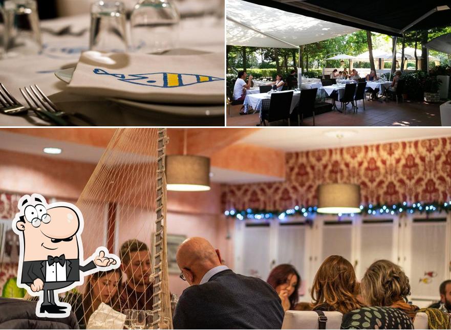 Dai un'occhiata agli interni di Ostaria del Mare