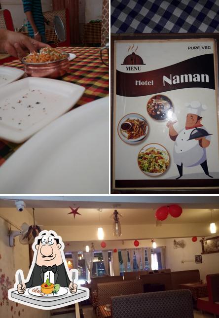 Check out the image depicting food and interior at HOTEL NAMAN pure veg Family Restaurant