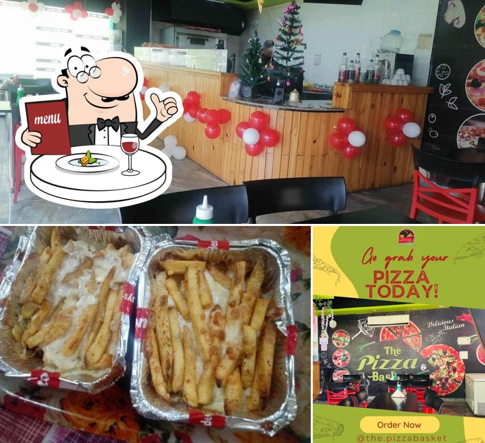 This is the image depicting food and interior at The Pizza Basket
