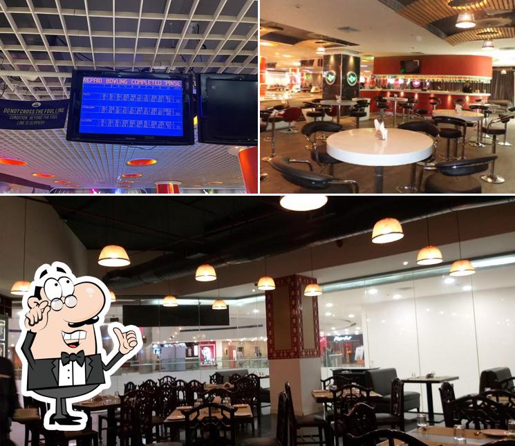 Take a seat at one of the tables at Amoeba Sports Bar