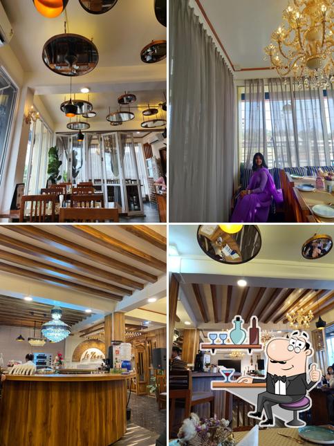 Take a seat at one of the tables at Le Zara Imphal