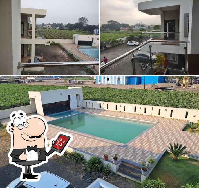 Enjoy the view at the outside area of Rajadhiraj Hotel