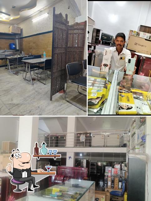 Take a seat at one of the tables at Jameel Hotel