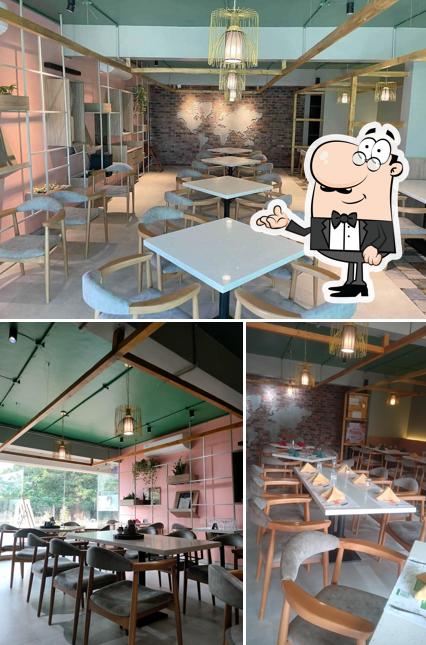 Take a seat at one of the tables at Rarus - Offbeat Dining Experience