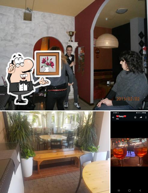 Dai un'occhiata agli interni di Roby Bar