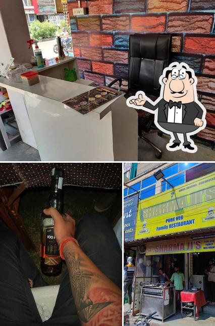 This is the image depicting interior and beverage at Sharma Restaurant
