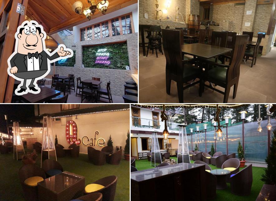 Take a seat at one of the tables at The Que Cafe