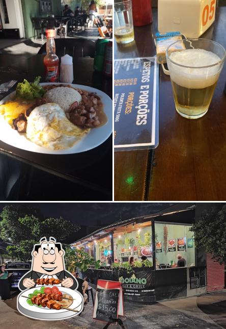 Dê uma olhada a foto mostrando comida e exterior no Goiano Bar & Gril