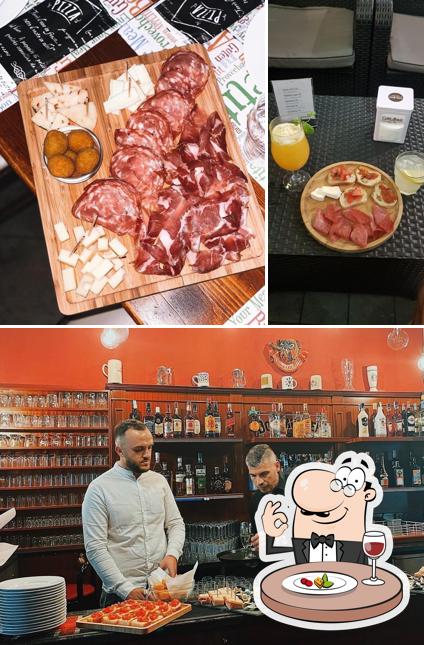 Questa è la foto che raffigura la cibo e bancone da bar di Graffiti Pub