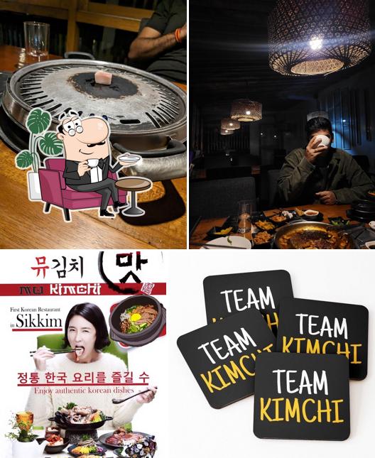 Take a seat at one of the tables at Mu Kimchi