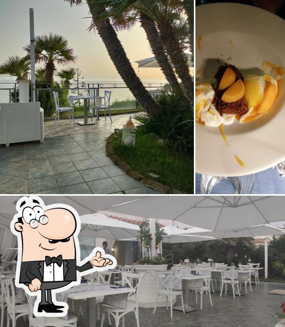 Dai un’occhiata alla foto che mostra la interni e cibo di Amare Club
