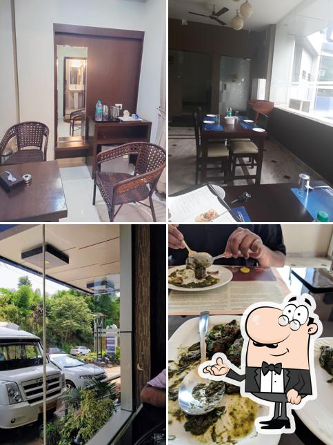 Take a seat at one of the tables at Zaffron by Le Coorg