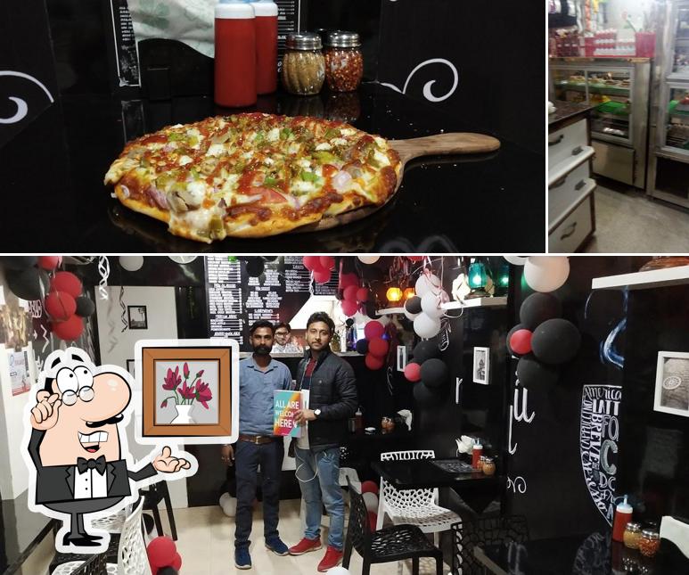 Among various things one can find interior and pizza at PB11 SMOOTHIES