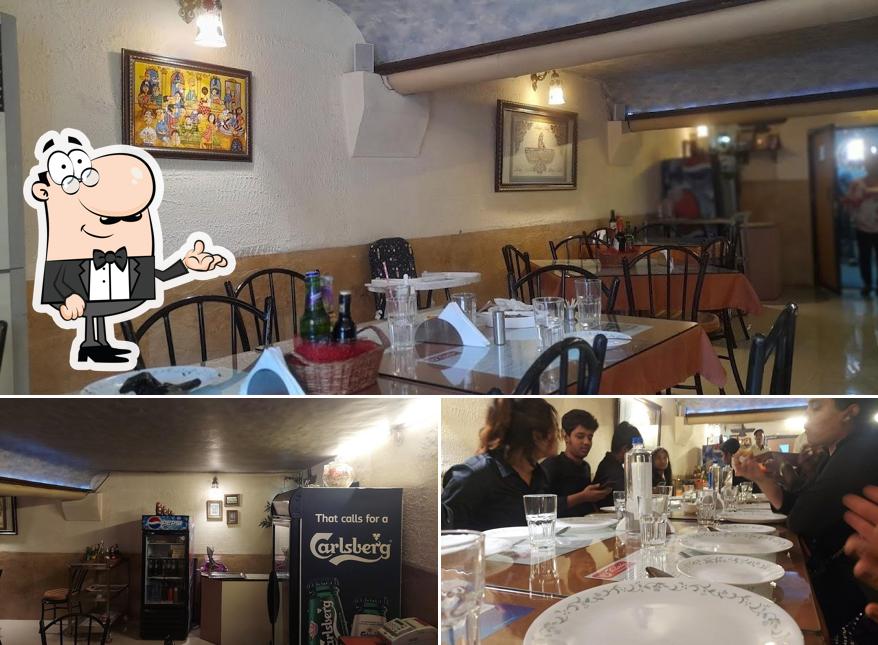 Take a seat at one of the tables at KINGS PERSIAN BISTRO