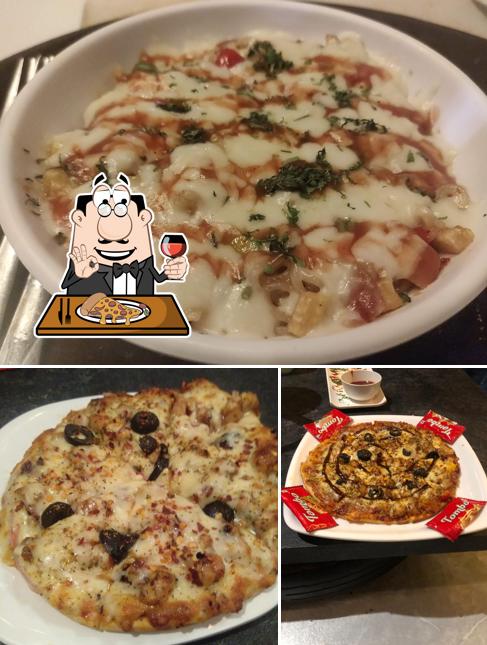 Pick pizza at Cafe Panama the Sports Lounge