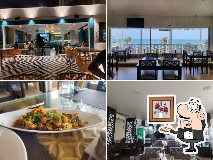 Check out how Escape in Best Restaurant Cafe Rock Beach View near by White Town Sea Foods Top in Pondicherry looks inside