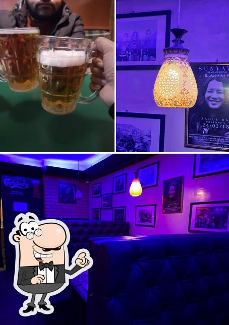 Take a look at the photo showing interior and food at Anum Pedro