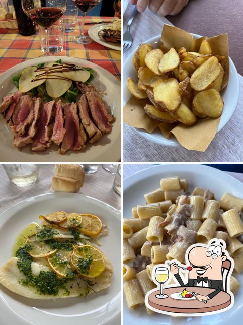 Platti al Trattoria Cacciatore Cucina del Lago d'Iseo e Valcamonica