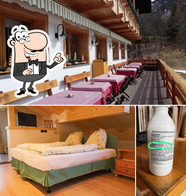 Siediti a un tavolo di Rifugio Flora Alpina