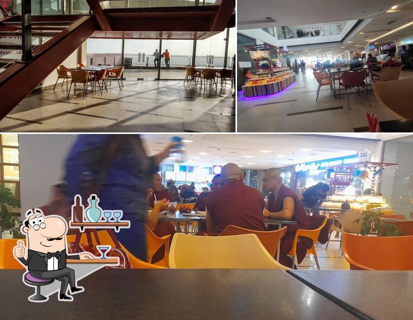 Take a seat at one of the tables at Maximus Mall, Dharamshala