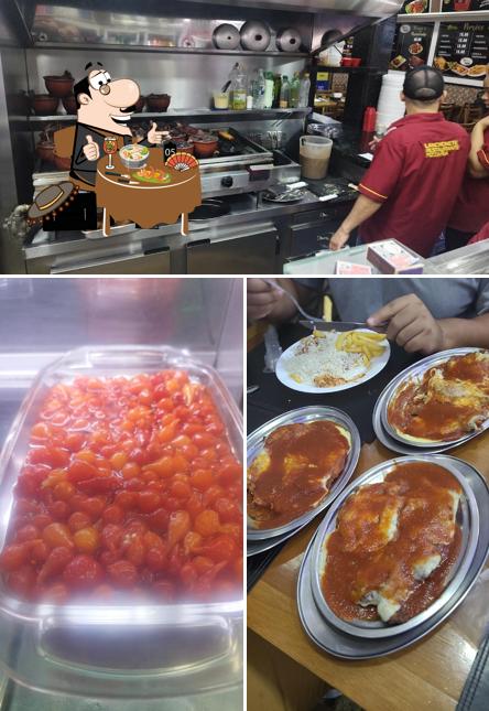 A foto a Estrela de Utinga’s comida e interior