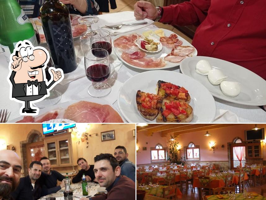 Tra le diverse cose da Ristorante Pizzeria Bella Vista si possono trovare la interni e cibo