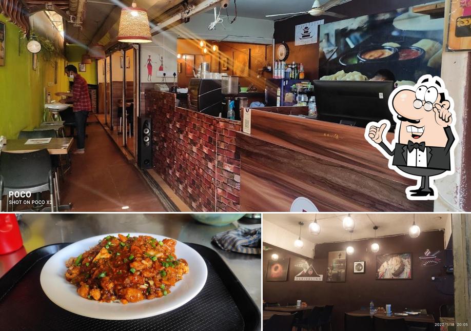 This is the photo showing interior and food at D Cafe' & Momos restaurant