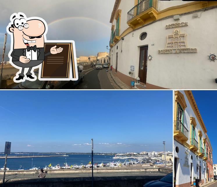 Puoi goderti l'aria fresca da seduto all'esterno di Osteria Porto Antico