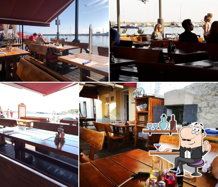 Dai un'occhiata agli interni di Konoba Šime