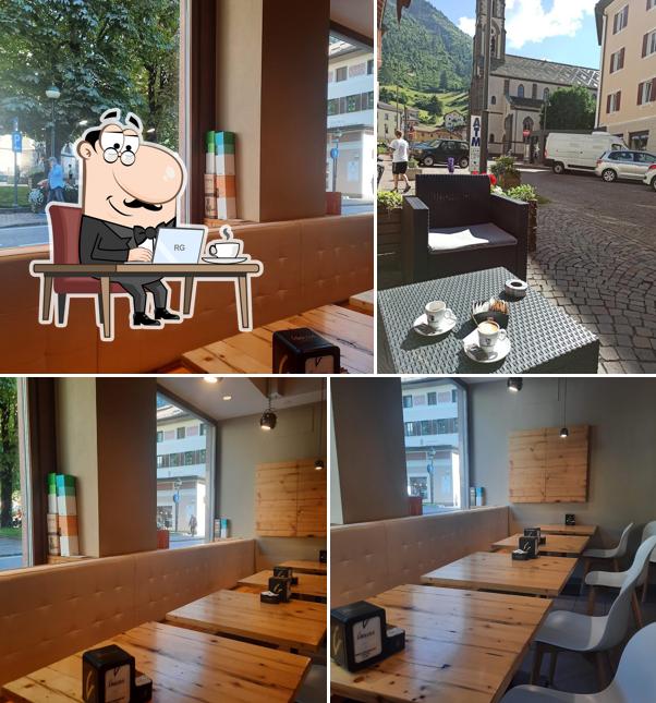 Questa è la immagine che presenta la interni e esterno di Caffè Predazzo