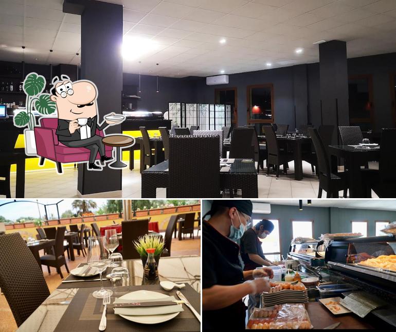 Dai un'occhiata agli interni di mia sushi ristorante pizzeria