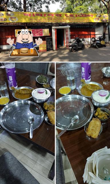 The photo of food and exterior at Jajabor Hotel